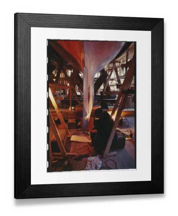 Framed Print : Man Working on Yacht Construction Framed Print : Man Working on Yacht Construction