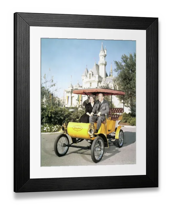 Framed Print : Walt Disney and Wife Riding in Antique Auto at Disneyland Framed Print : Walt Disney and Wife Riding in Antique Auto at Disneyland