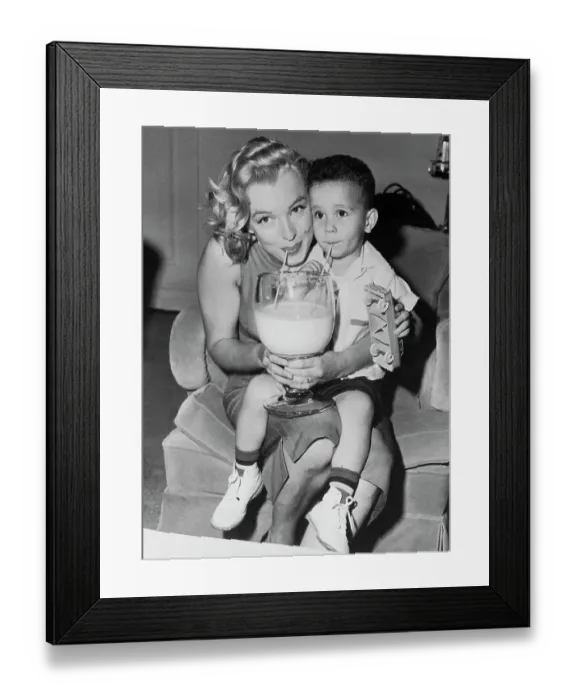 Framed Print : Marilyn Monroe and Boy Drinking Milk from Straws Framed Print : Marilyn Monroe and Boy Drinking Milk from Straws