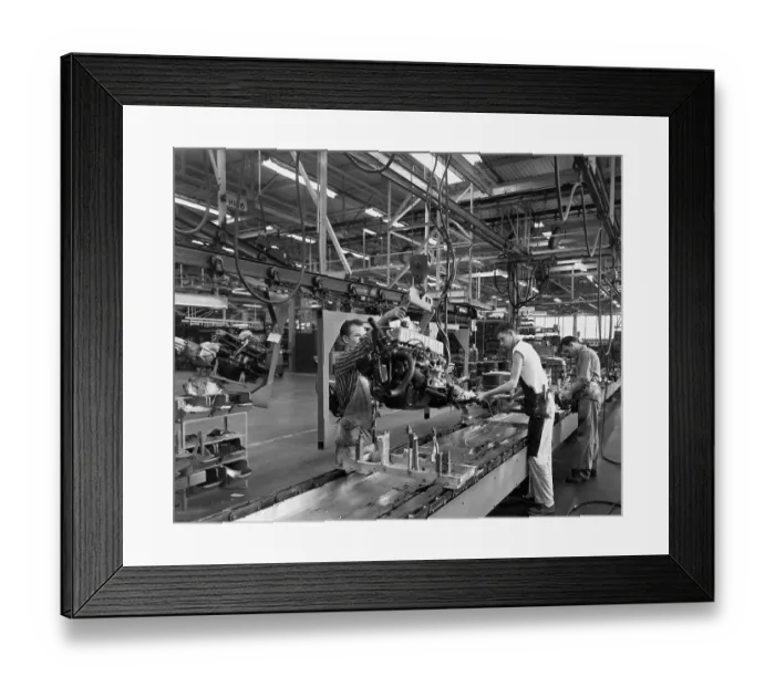 Framed Print : Men Working on Engine in Assembly Plant Framed Print : Men Working on Engine in Assembly Plant