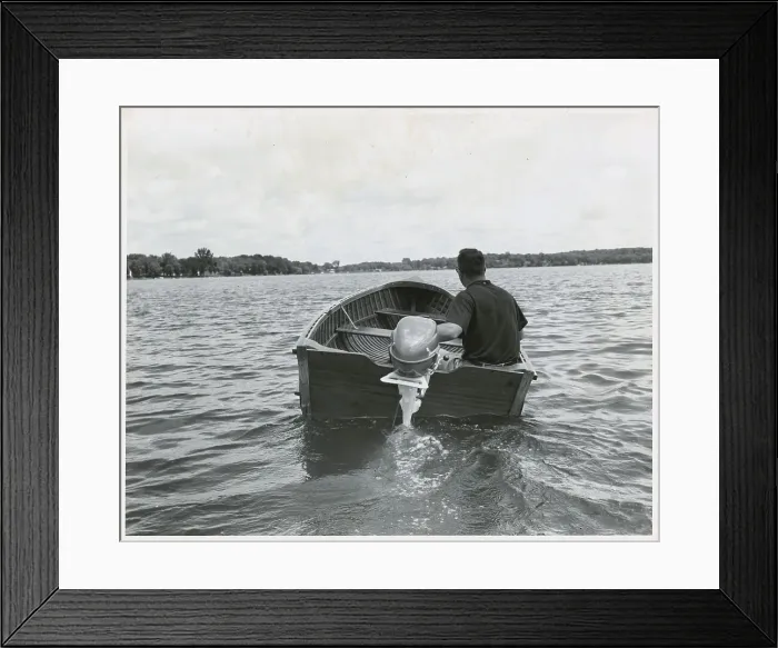 Framed Print : Man in Small Motor Boat Framed Print : Man in Small Motor Boat