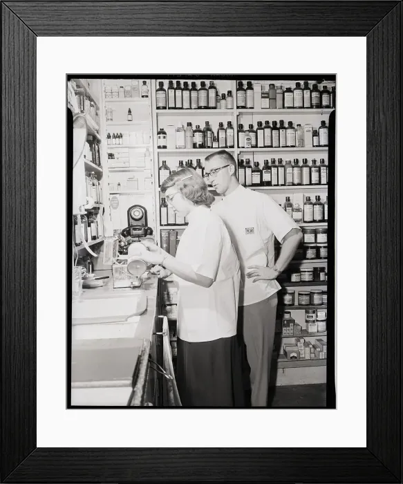 Framed Print : Pharmacist and Assistant Framed Print : Pharmacist and Assistant