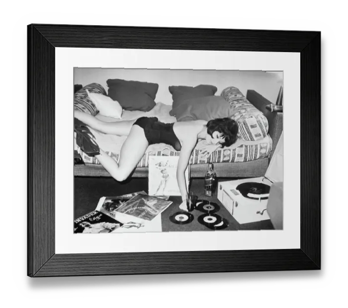 Framed Print : Woman Relaxing on Couch Framed Print : Woman Relaxing on Couch