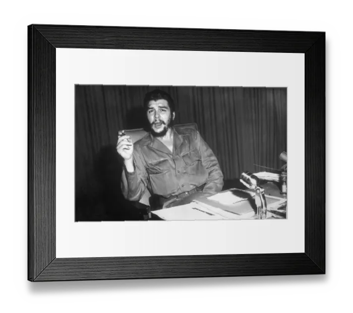 Framed Print : Che Guevara Sitting at a Desk Framed Print : Che Guevara Sitting at a Desk