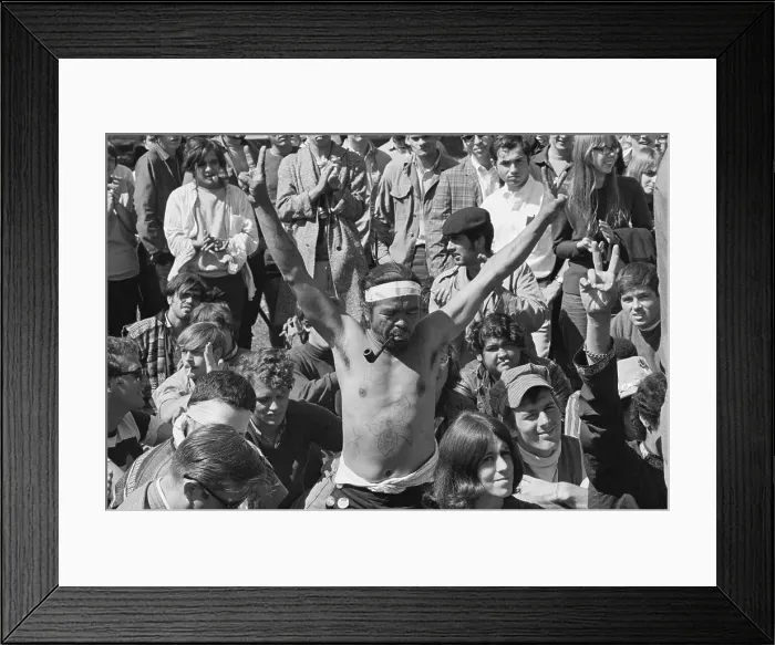 Framed Print : Man Giving Peace Sign at Rally Framed Print : Man Giving Peace Sign at Rally