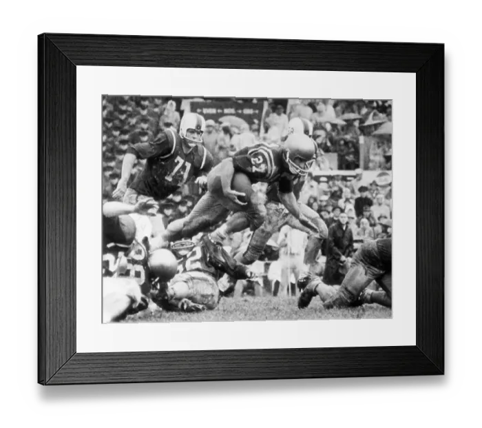 Framed Print : Football Player Leaping into Air Framed Print : Football Player Leaping into Air
