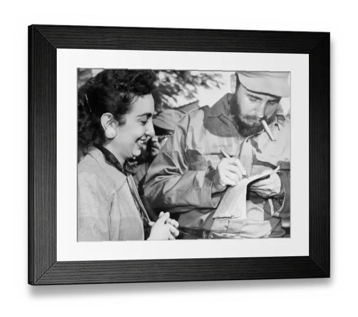 Framed Print : Premier Fidel Castro Signing His Autograph for a Woman Framed Print : Premier Fidel Castro Signing His Autograph for a Woman