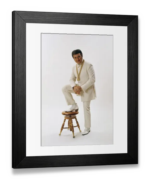 Framed Print : World Famous Liberace Posing in White on White Set Framed Print : World Famous Liberace Posing in White on White Set