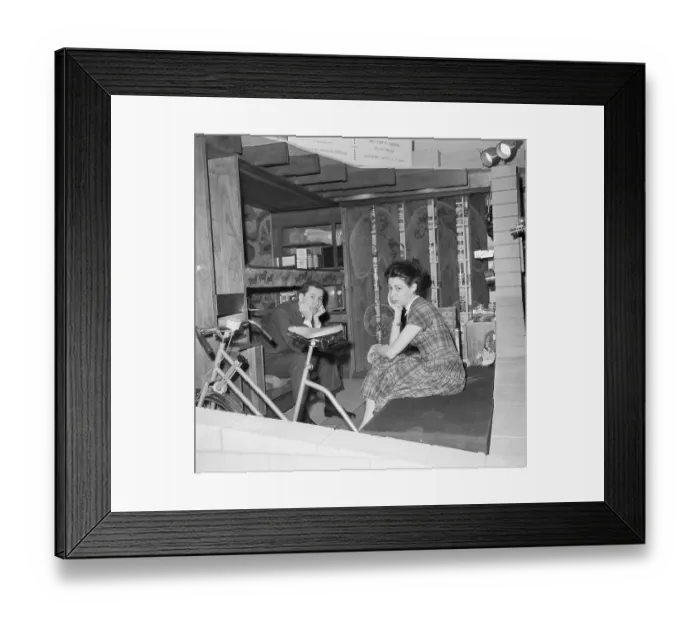 Framed Print : Couple Sitting in Fallout Shelter Framed Print : Couple Sitting in Fallout Shelter