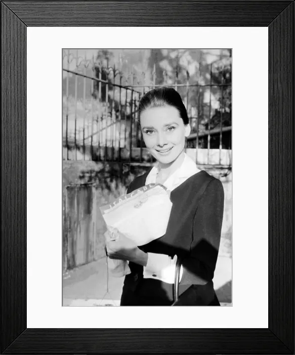 Framed Print : Audrey Hepburn Holding Telegram