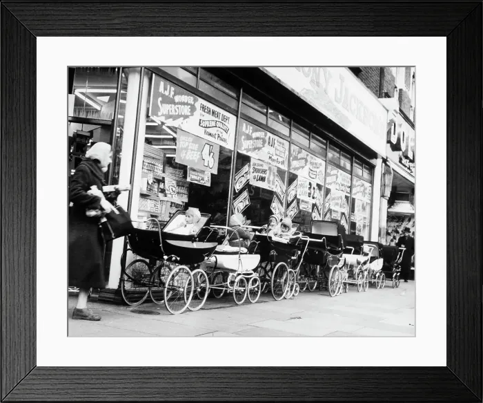 Framed Print : Baby Carriages Lined up Outside Store Framed Print : Baby Carriages Lined up Outside Store