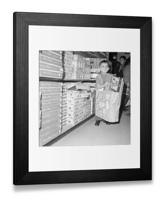 Framed Print : Orphan Boy Carrying Bag of Toys Framed Print : Orphan Boy Carrying Bag of Toys