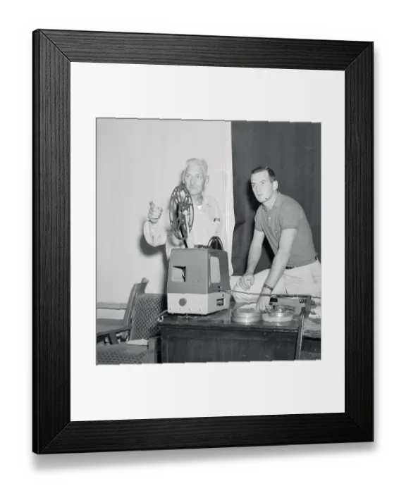 Framed Print : Men with Film Projector Framed Print : Men with Film Projector