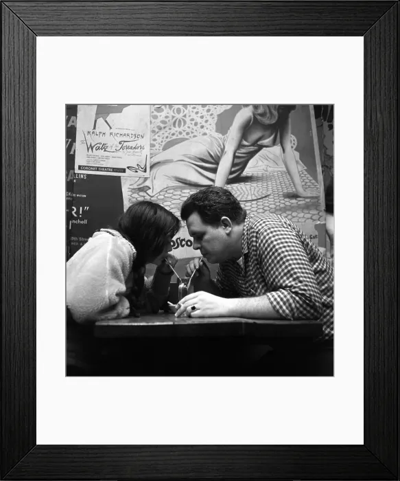 Framed Print : Couple Sharing Drink At Beat Cafe Framed Print : Couple Sharing Drink At Beat Cafe
