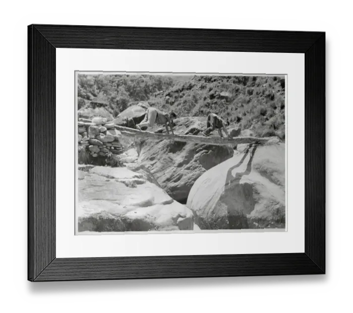 Framed Print : Two Tibetan Refugees Using Log as Bridge Framed Print : Two Tibetan Refugees Using Log as Bridge