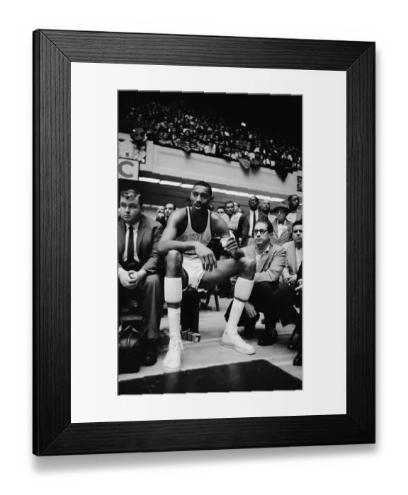 Framed Print : Wilt Chamberlain Sitting on Sideline Framed Print : Wilt Chamberlain Sitting on Sideline