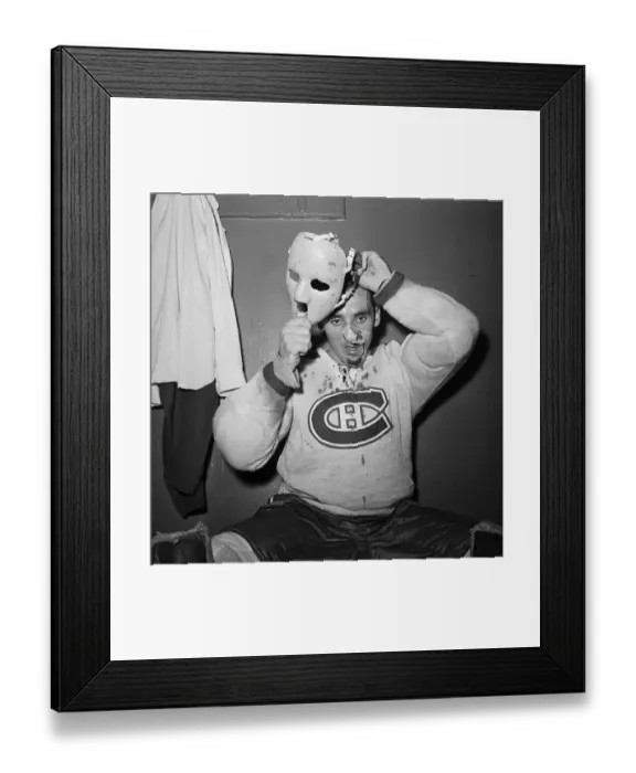 Framed Print : Jacques Plante Putting on Mask