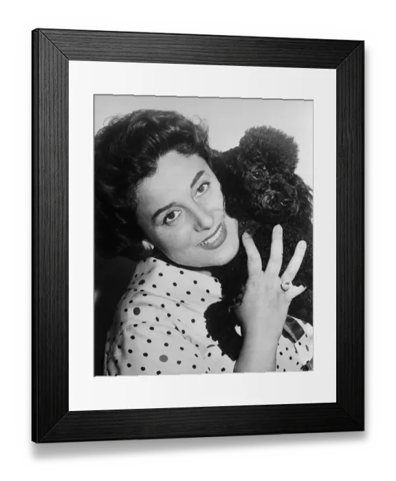 Framed Print : Antonietta Stella Holding Pet Poodle Framed Print : Antonietta Stella Holding Pet Poodle