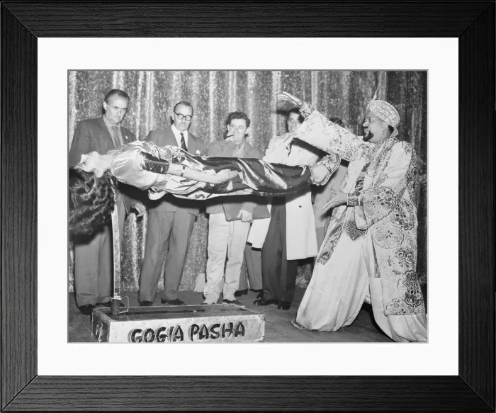 Framed Print : Indian Magician Gogia Pasha and Daughter During Levitation Act Framed Print : Indian Magician Gogia Pasha and Daughter During Levitation Act