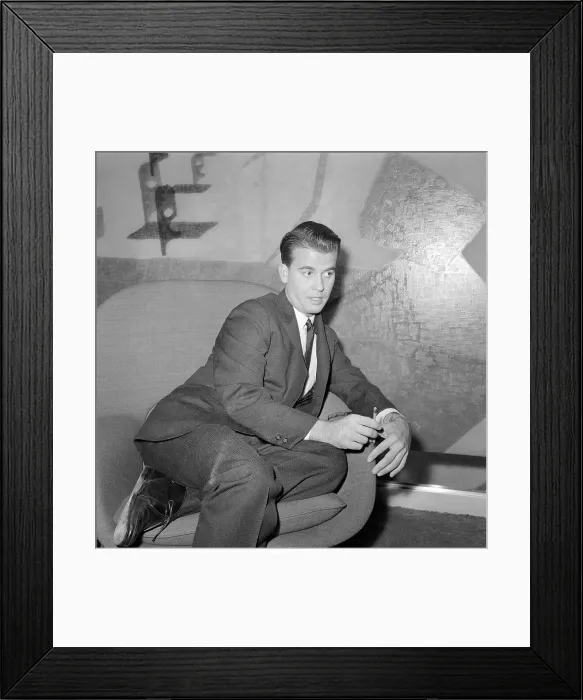 Framed Print : Dick Clark Seated Counting Fingers