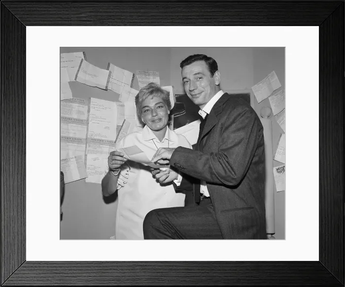 Framed Print : Signoret and Montand Go Through Telegrams