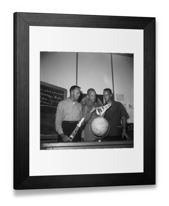 Framed Print : Astronauts Holding Rocket Models Framed Print : Astronauts Holding Rocket Models