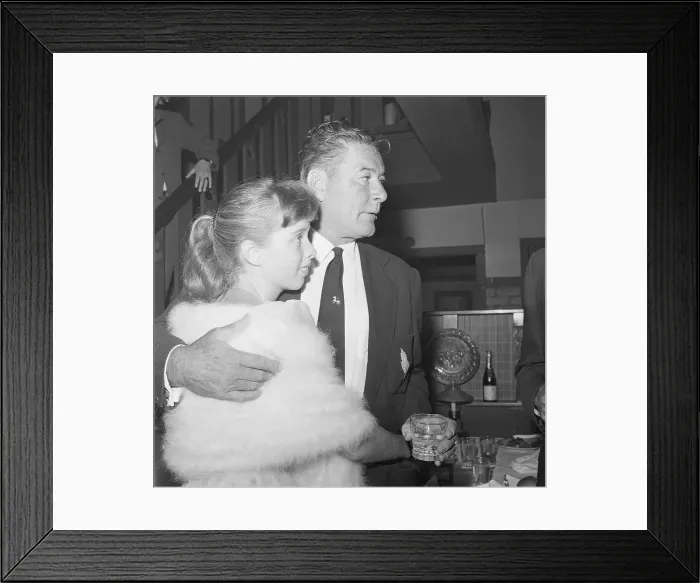 Framed Print : Errol Flynn Embracing His Daughter