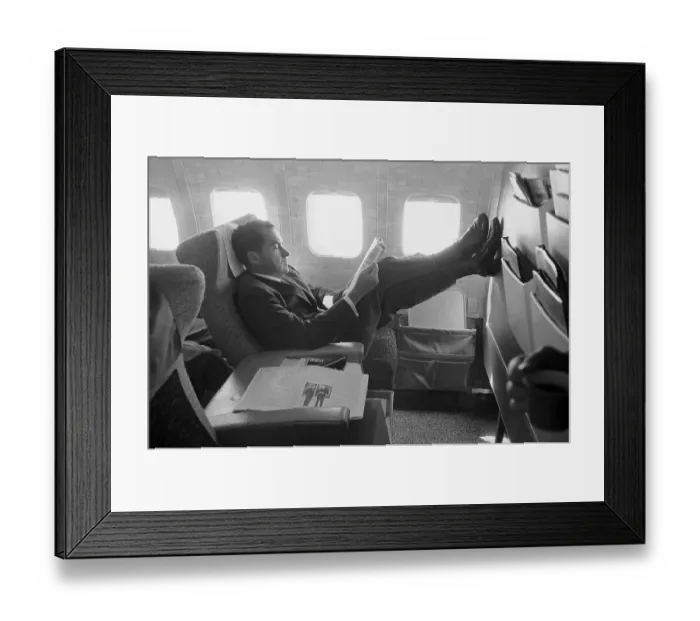 Framed Print : Richard Nixon Relaxing on Plane Framed Print : Richard Nixon Relaxing on Plane