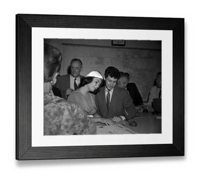 Framed Print : Elizabeth Taylor and Eddie Fisher Reading Marriage License Framed Print : Elizabeth Taylor and Eddie Fisher Reading Marriage License
