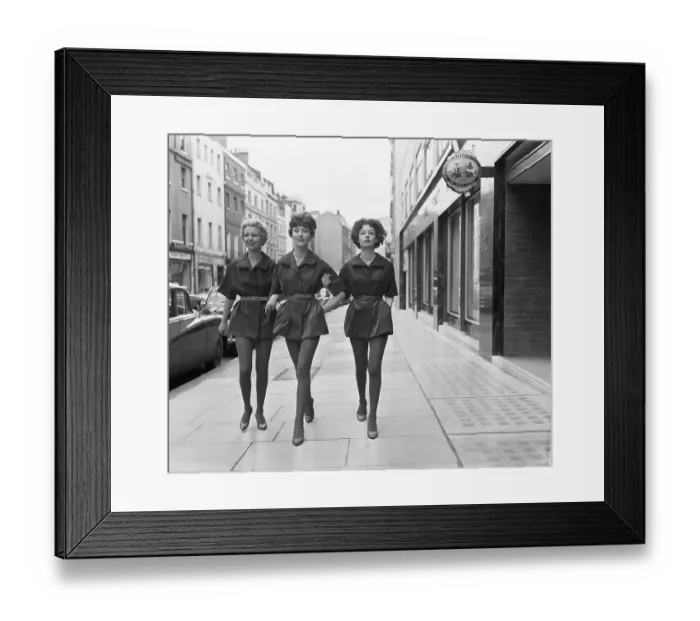 Framed Print : Women In Short Skirts, Tights Walk Street Framed Print : Women In Short Skirts, Tights Walk Street