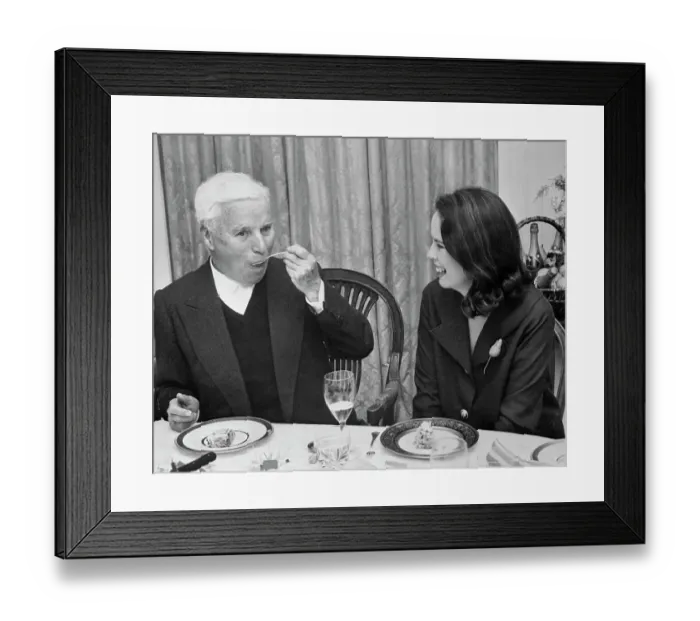 Framed Print : Charlie Chaplin Eating His Birthday Cake Framed Print : Charlie Chaplin Eating His Birthday Cake