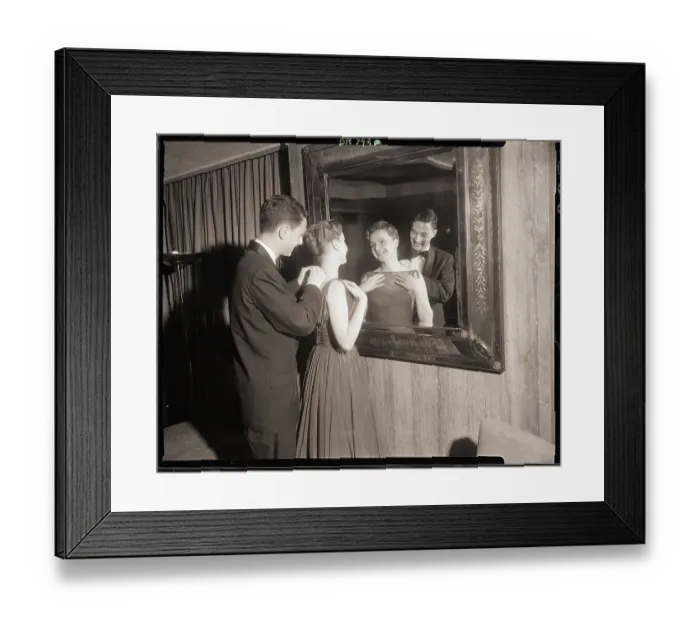Framed Print : Boy Fastening Necklace on Girls Neck