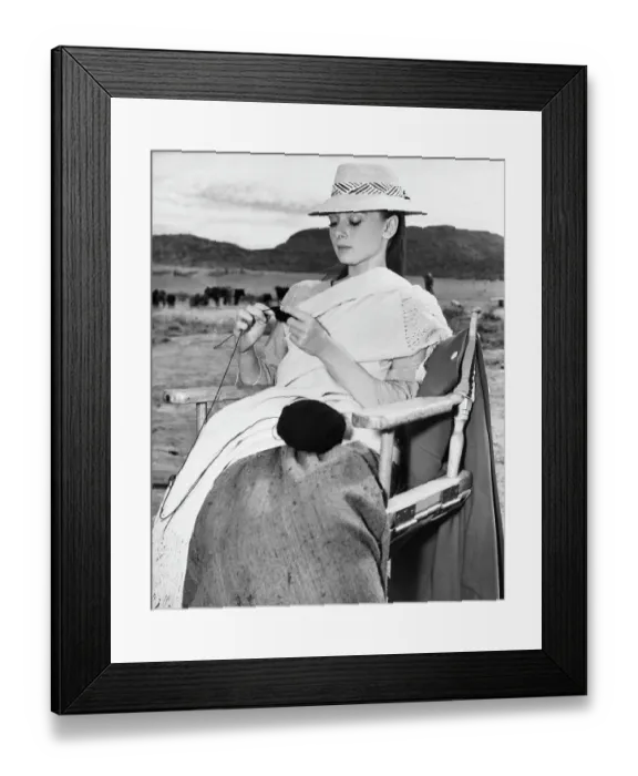 Framed Print : Audrey Hepburn Knitting While on Film Location Framed Print : Audrey Hepburn Knitting While on Film Location