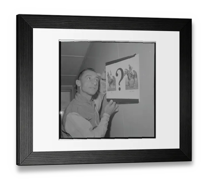 Framed Print : Eddie Arcaro Holding Up Pictures of Horse Choices Framed Print : Eddie Arcaro Holding Up Pictures of Horse Choices