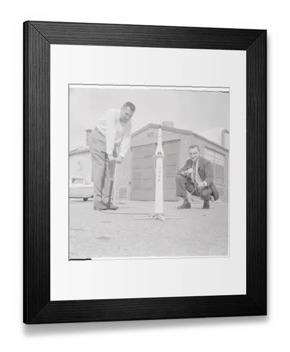 Framed Print : Toy Designers Testing Toy Missile Outdoors Framed Print : Toy Designers Testing Toy Missile Outdoors