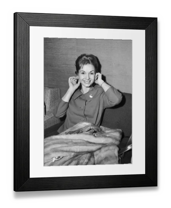 Framed Print : Debbie Reynolds At Airport, Holding Ears Framed Print : Debbie Reynolds At Airport, Holding Ears