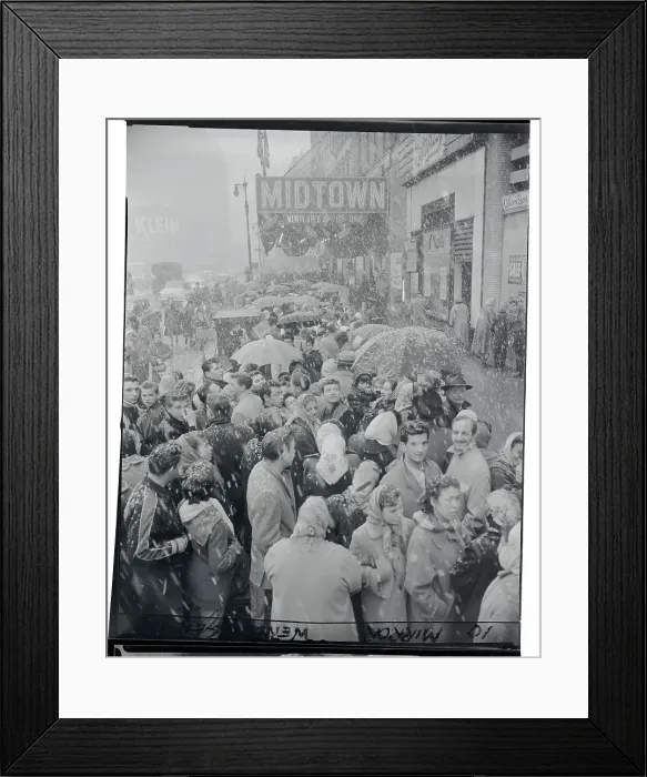 Framed Print : Crowds Waiting in Snow for Sale Items
