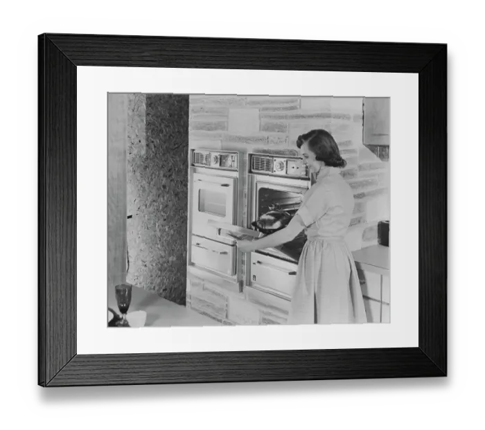 Framed Print : Woman Putting Roast in New Automatic Oven Framed Print : Woman Putting Roast in New Automatic Oven