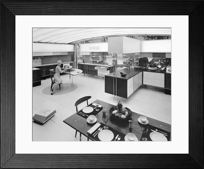Framed Print : Woman Sitting in Modernized Kitchen Framed Print : Woman Sitting in Modernized Kitchen