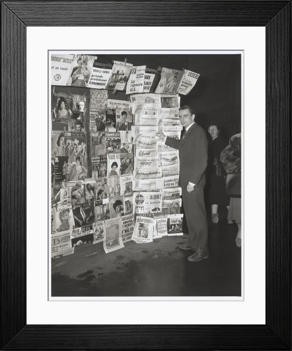 Framed Print : Jean Pierre Guillaume Pausing at Newspaper Stand Framed Print : Jean Pierre Guillaume Pausing at Newspaper Stand