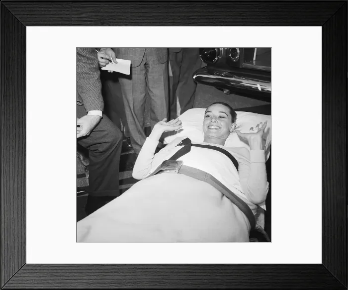 Framed Print : Audrey Hepburn Lying on a Stretcher Framed Print : Audrey Hepburn Lying on a Stretcher