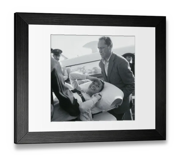 Framed Print : People Carrying Audrey Hepburn on a Stretcher Framed Print : People Carrying Audrey Hepburn on a Stretcher