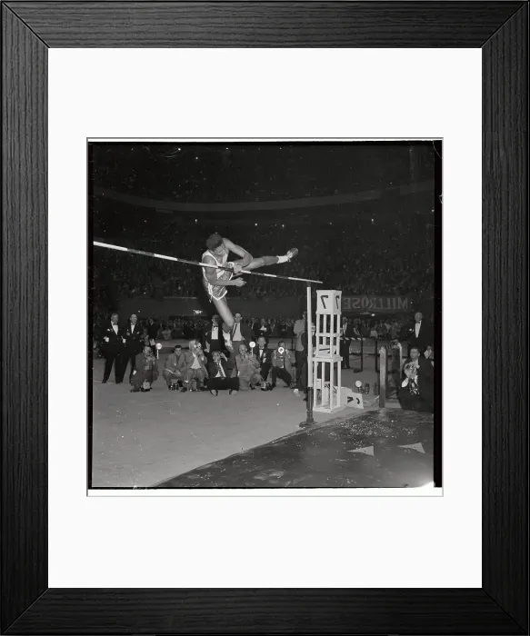 Framed Print : John Thomas Clearing the High Bar