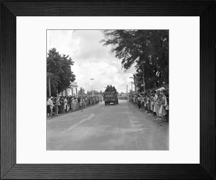 Framed Print : Distant View of Fidel Castro Riding on Truck with Soldiers Framed Print : Distant View of Fidel Castro Riding on Truck with Soldiers