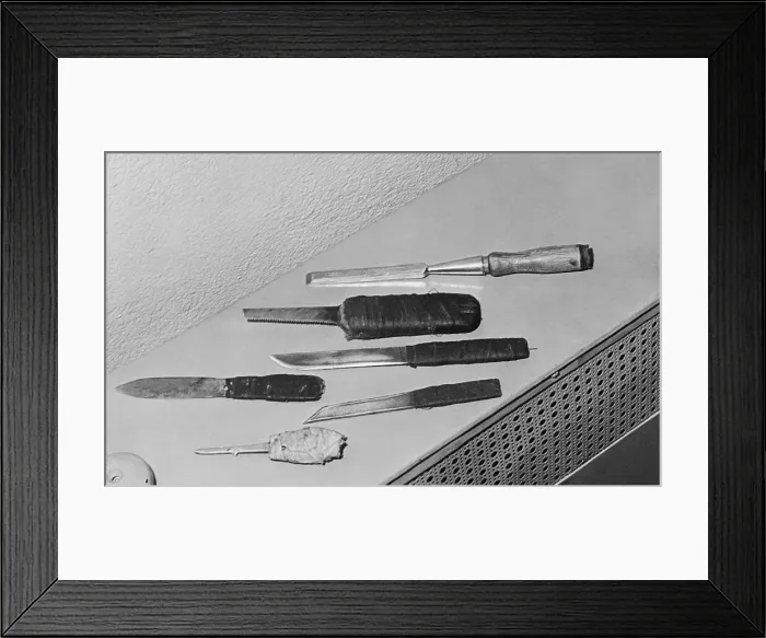 Framed Print : Prisoner's Knives Laid Out on Table Framed Print : Prisoner's Knives Laid Out on Table