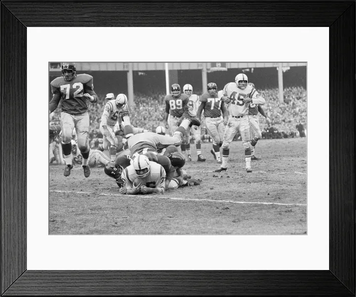 Framed Print : Alan Ameche Being Tackled by New York Defenders Framed Print : Alan Ameche Being Tackled by New York Defenders