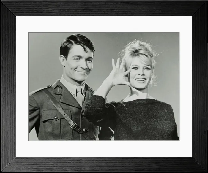 Framed Print : Brigitte Bardot Saluting Next to Jacques Charrier Framed Print : Brigitte Bardot Saluting Next to Jacques Charrier