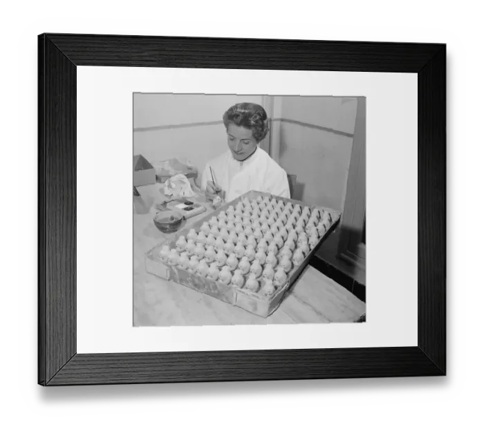 Framed Print : Woman Painting Doll Faces Framed Print : Woman Painting Doll Faces