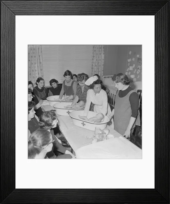 Framed Print : Education on Bathing Babies Framed Print : Education on Bathing Babies