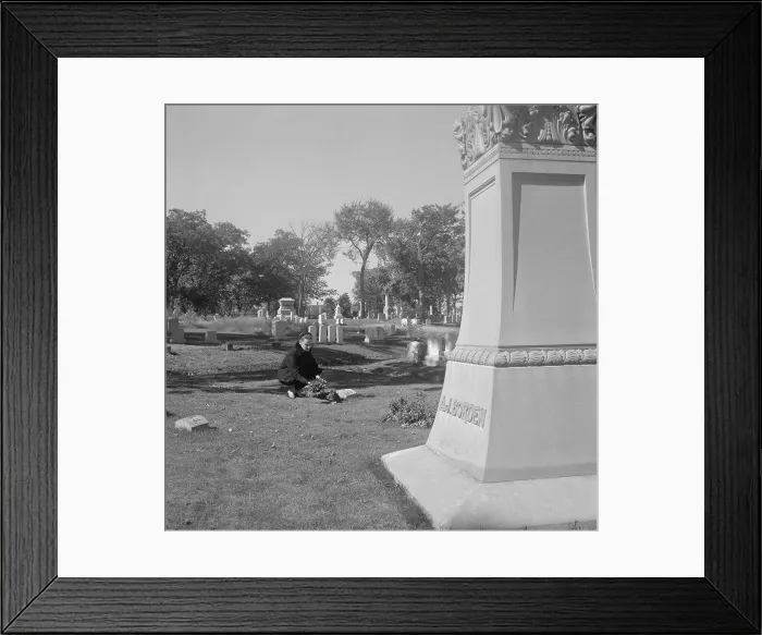 Framed Print : Woman Placing Wreath on Grave of Lizzie Borden Framed Print : Woman Placing Wreath on Grave of Lizzie Borden